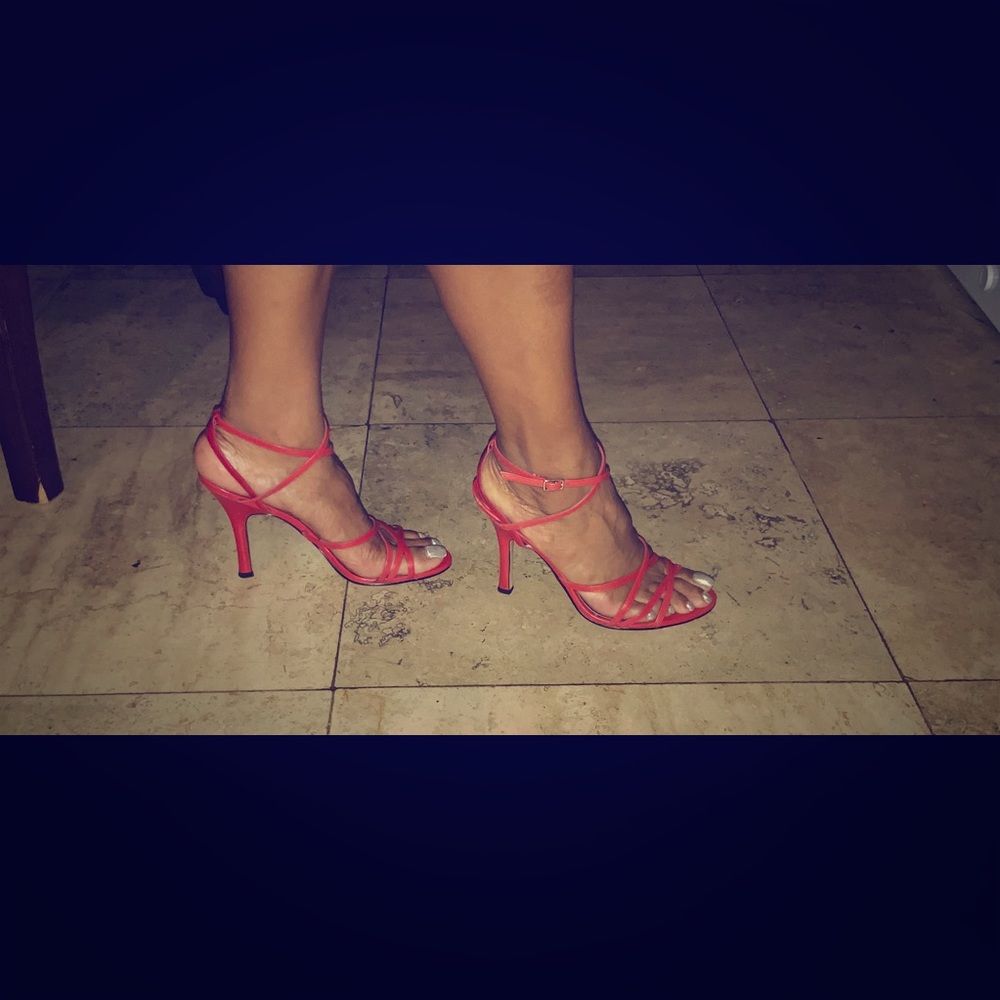 Red strapped heel.